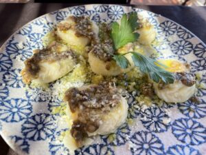 plate of sardinian ravioli with mushrooms 